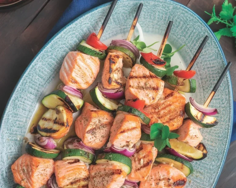 Mediterranean salmon skewers grilled to perfection with garlic and lemon marinade.